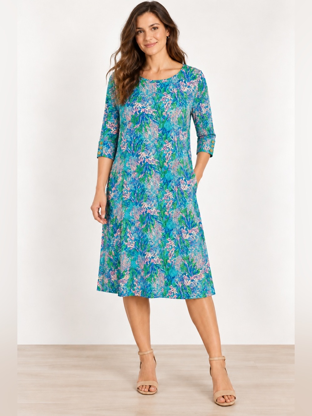 Lilly Pulitzer Dress with 3/4 sleeves adorned with gold buttons.